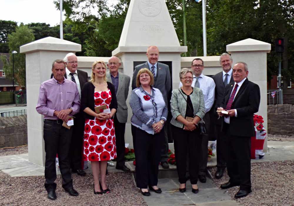 War Memorial Group stood next to the finished memorial statue